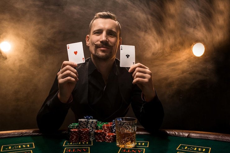 Live Infinite Blackjack dealer at link bolagila studio with multi-camera setup showing card layout